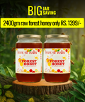 A jar of Forest Honey by Love of India brand placed in a forest setting with bees flying around it, indicating the natural and unpasteurized quality of the honey.
